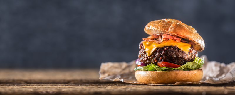 cheeseburger with lettuce and tomato
