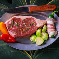 New York Strip Steak with brussel sprouts and peppers